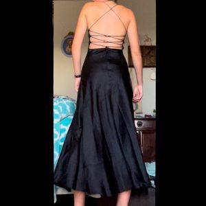 Long, slit, black dress with open back